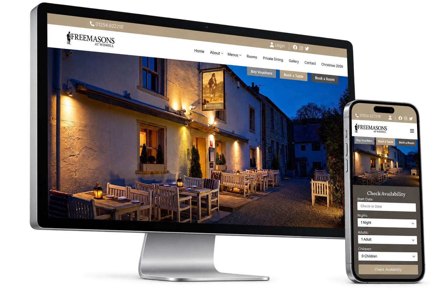 The The Freemasons At Wiswell website displayed on an Apple Studio Display and iPhone, isolated with soft natural shadows.