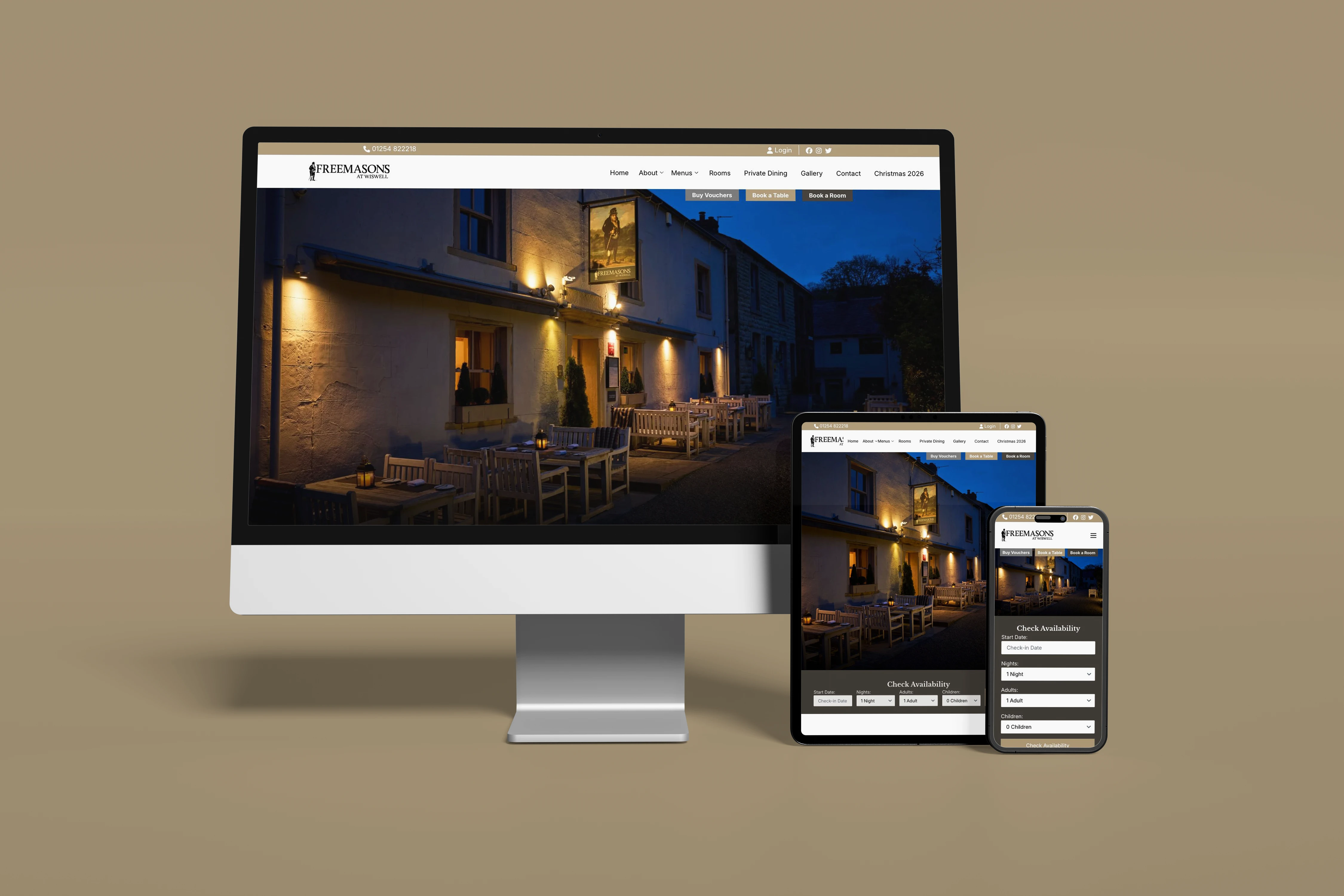 The Freemasons At Wiswell website displayed on desktop, tablet and mobile devices against its brand-coloured background.